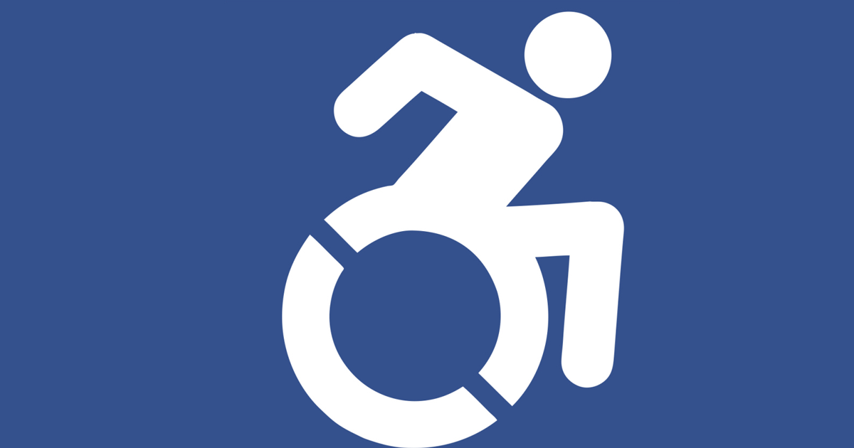 The updated version of the International Symbol of Access, aka the "wheelchair symbol". It's a profile of a stick figure man in a manual wheelchair pushing himself while leaning forward.
