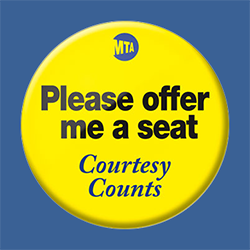 A yellow shirt "button" which has the MTA logo at the top, with the text "Please offer me a seat" underneath that in bold black text and "Courtesy Counts" underneath that in blue italic font. Jessy Yates joins us to discuss them.